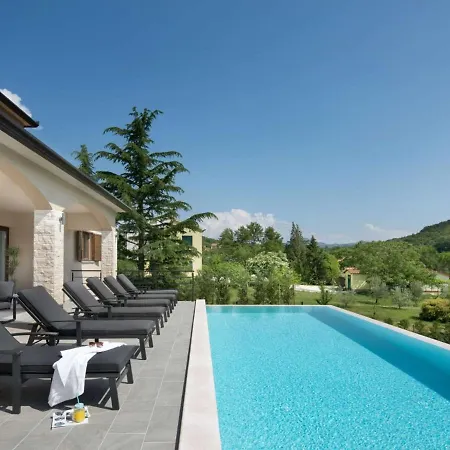 With Pool Surrounded By Woods In Labin